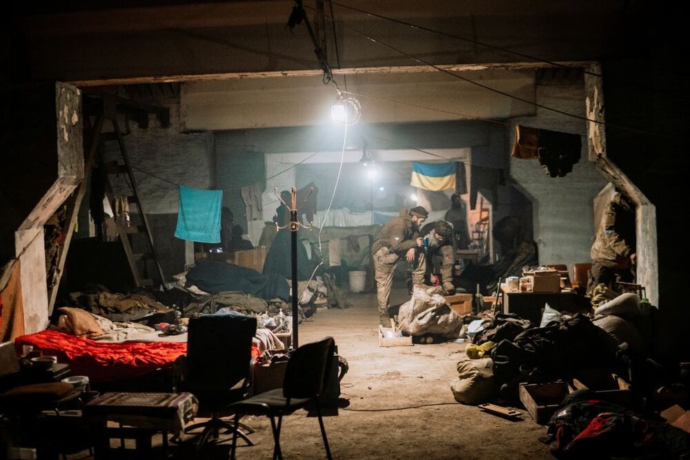 Ukrainian Azovstal service members are seen within the Azovstal Iron and Steel Works complex in Mariupol  / DMYTRO OREST KOZATSKYI/AZOV REGIMENT PRESS SERVICE