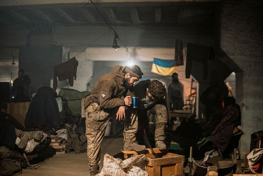 Ukrainian Azovstal service members are seen within the Azovstal Iron and Steel Works complex in Mariupol  / DMYTRO OREST KOZATSKYI/AZOV REGIMENT PRESS SERVICE