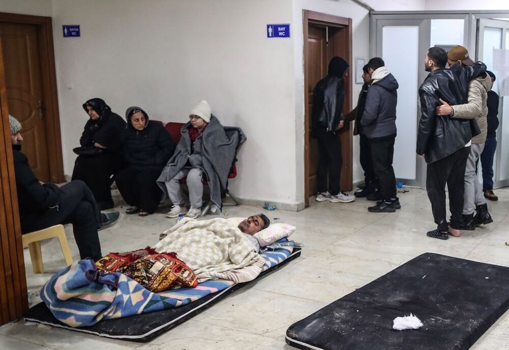 Injured people arrive at a hospital in Hatay following twin earthquakes  / ERDEM SAHIN